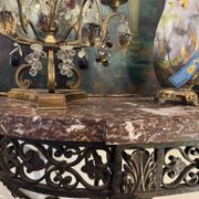 Console in wrought iron from the Napoleonic III period with a red Rance marble top.