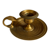Golden candle holder port hand