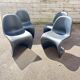 Set of 4 black Verner Panton Vitra chairs.