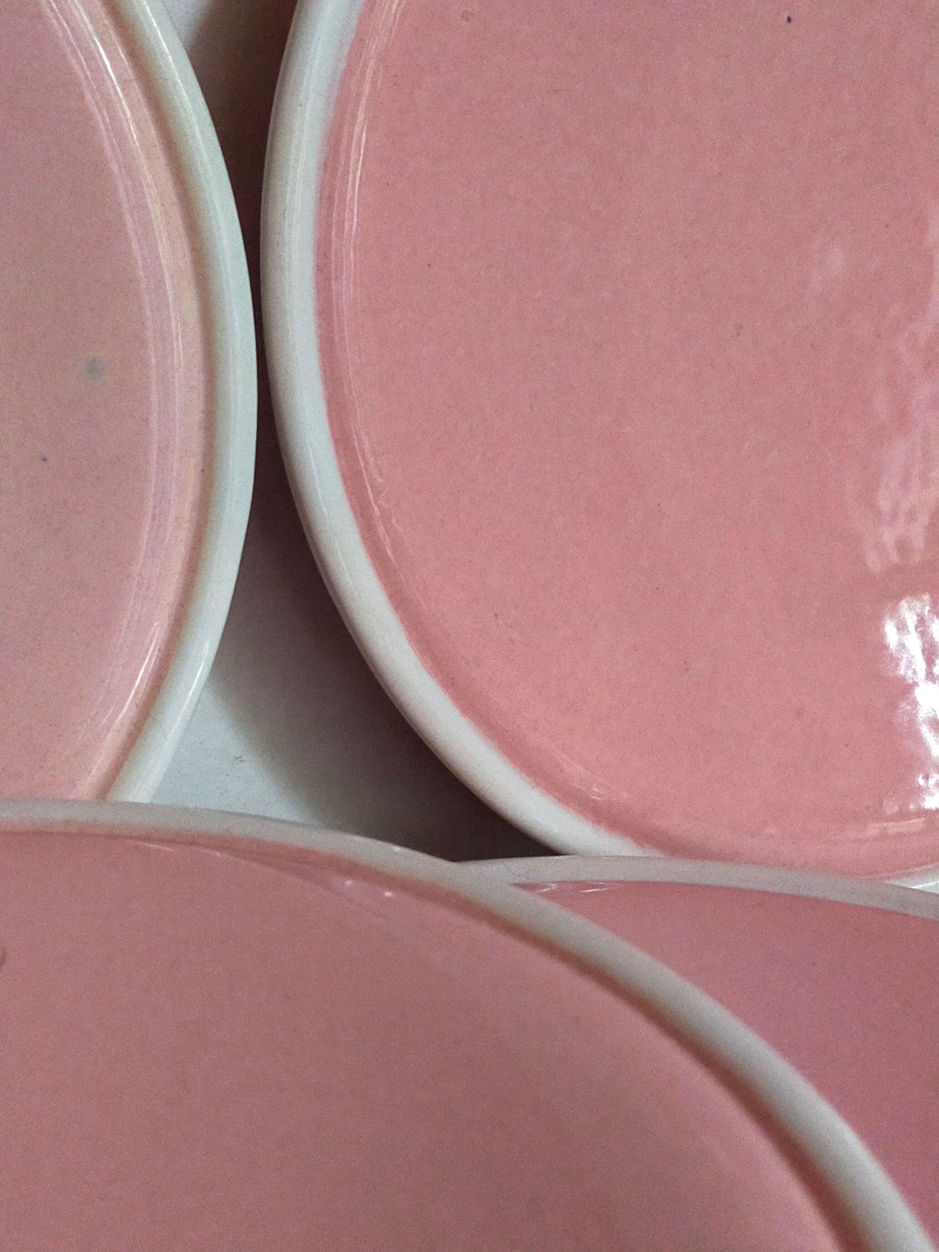 Six old pink earthenware dessert plates