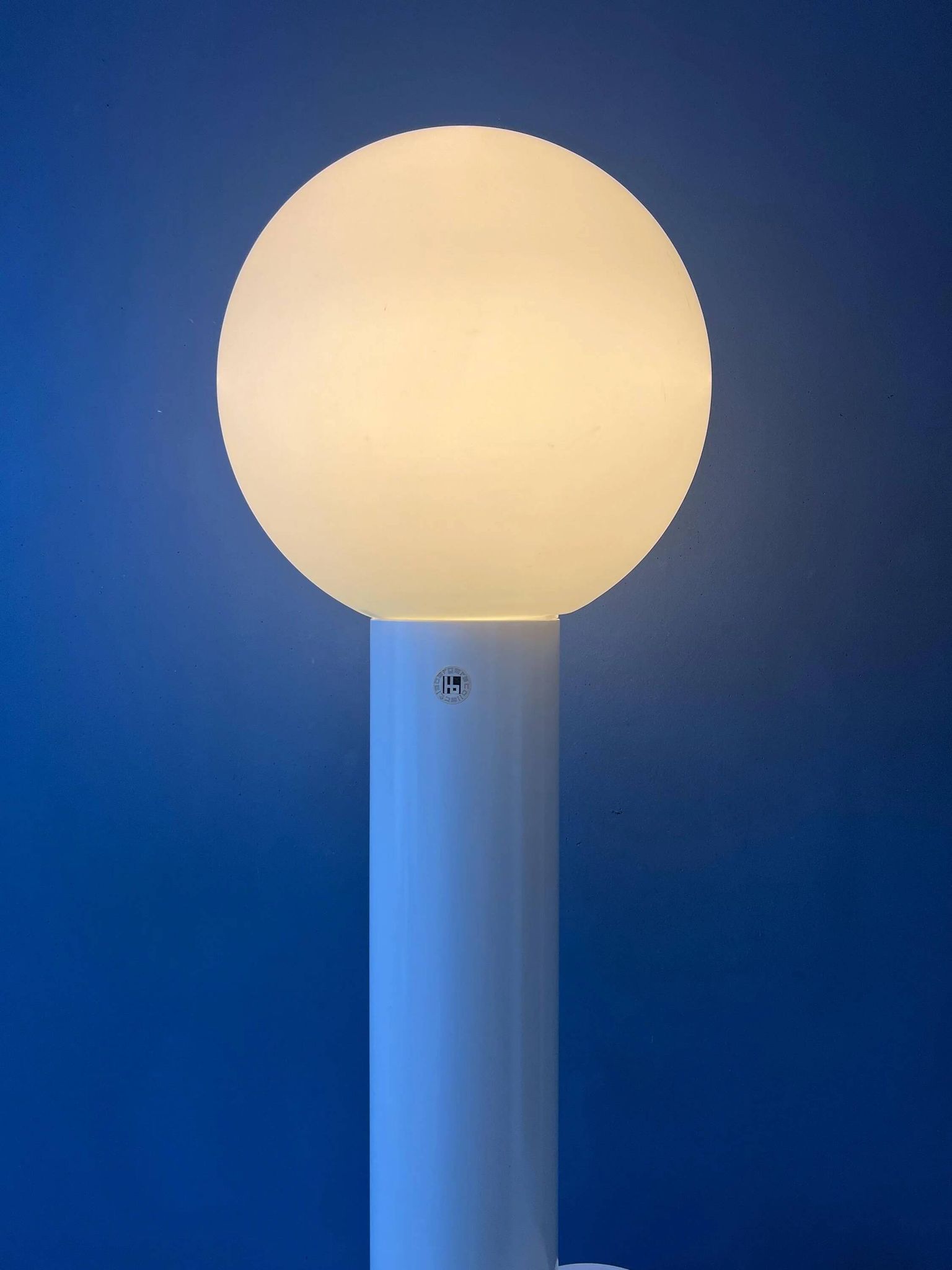 White floor lamp "Close Encounter" and plant stand by Kerst Koopman