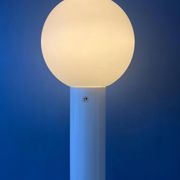 White floor lamp "Close Encounter" and plant stand by Kerst Koopman