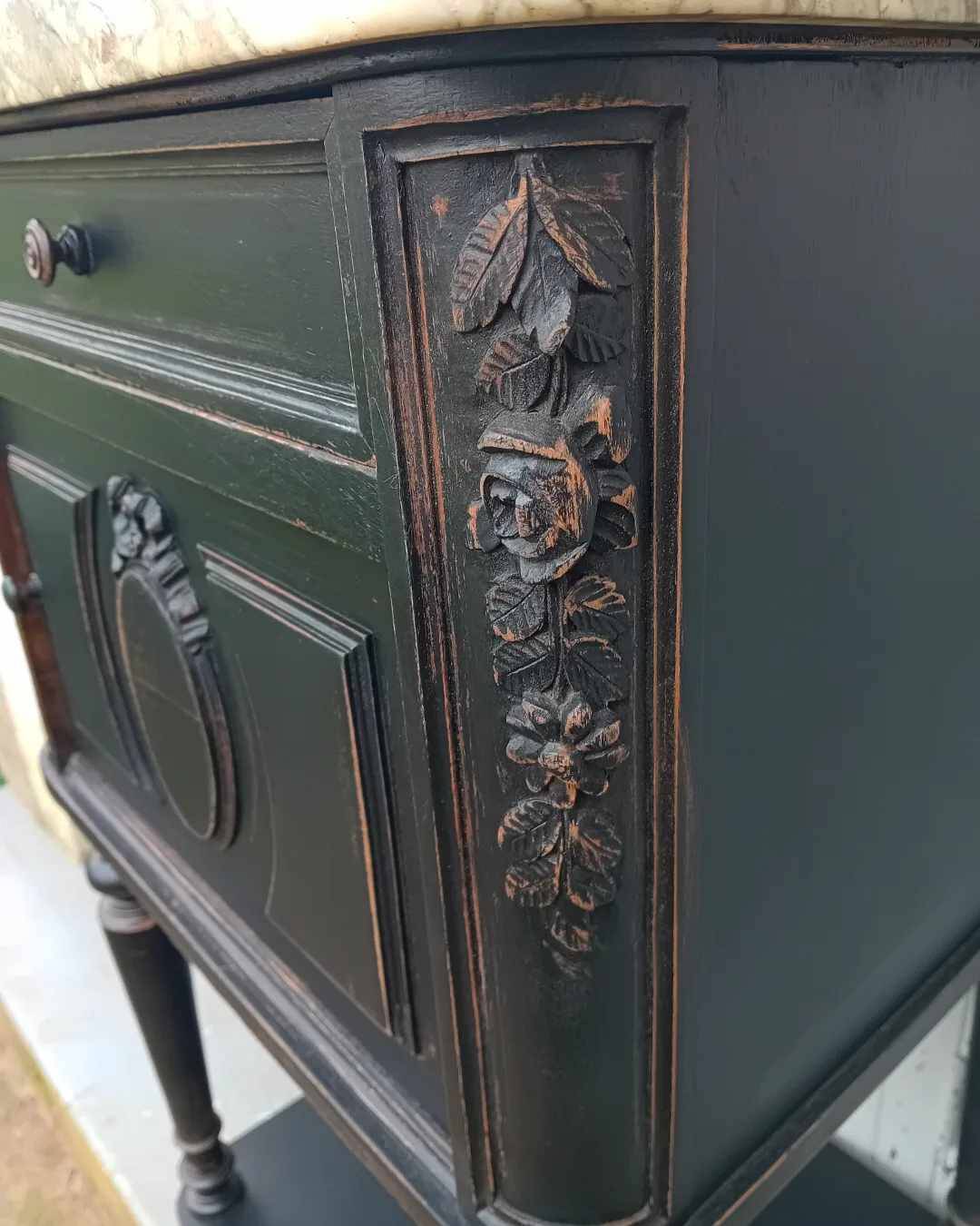 Romantic black bedside table with patinated marble and wood