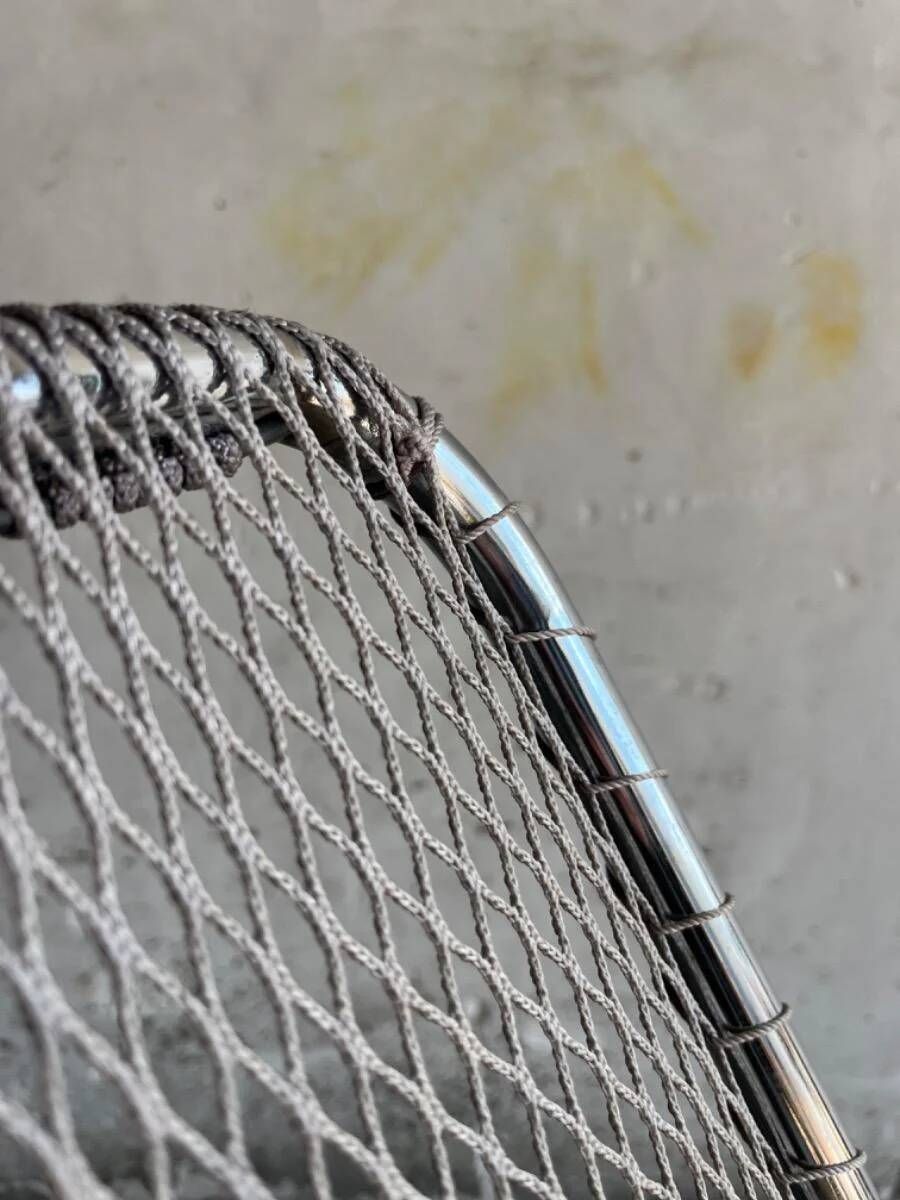 Set of two vintage folding chairs with an aluminium wire frame.