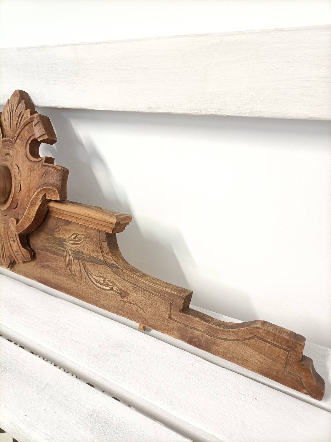 Antique carved wooden door pediment
