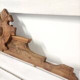 Antique carved wooden door pediment
