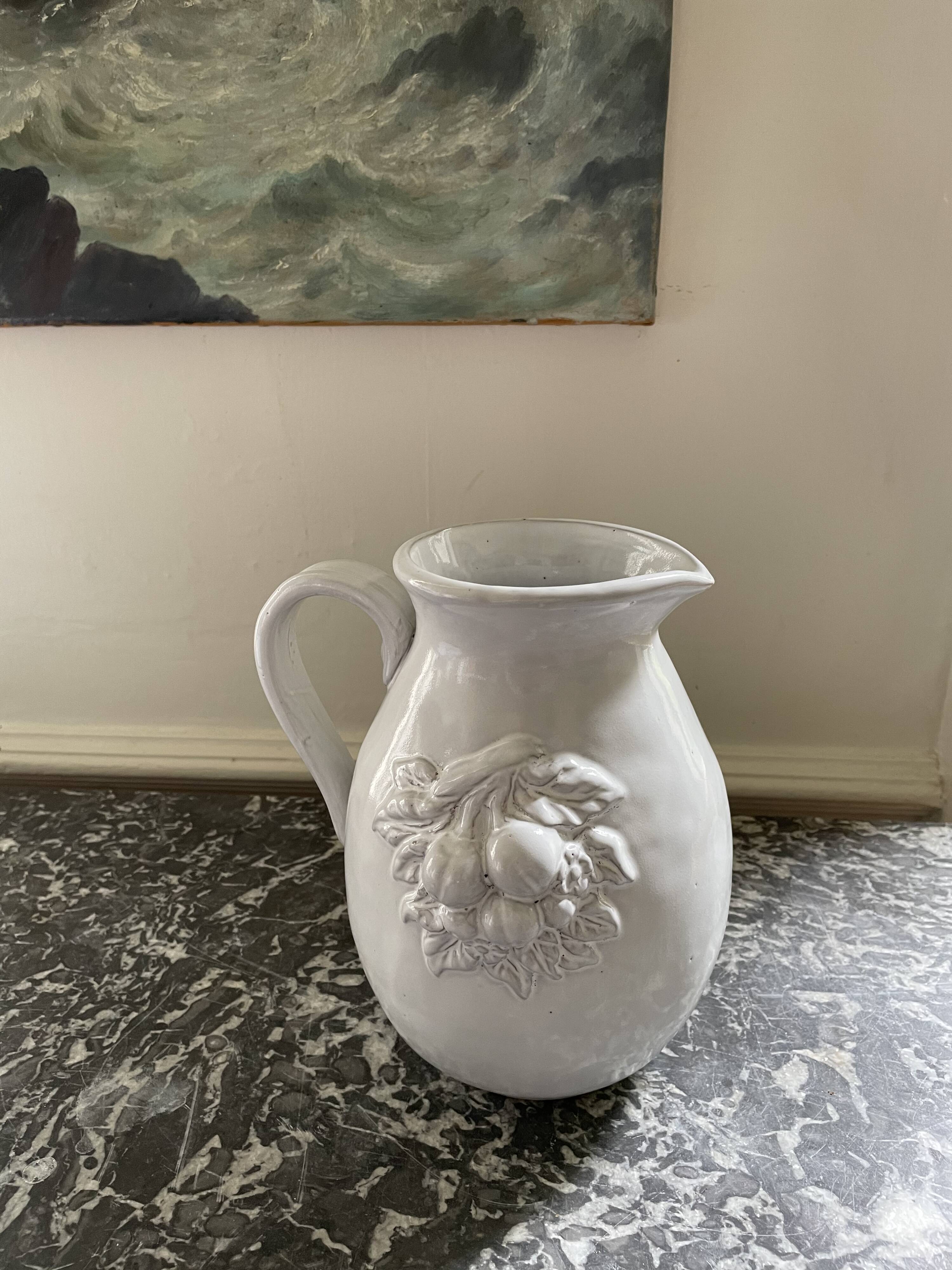 Pitcher in dabbling cherry decoration