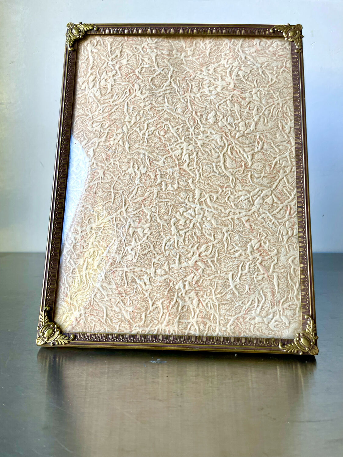 Metal vintage frame in gold colored brass