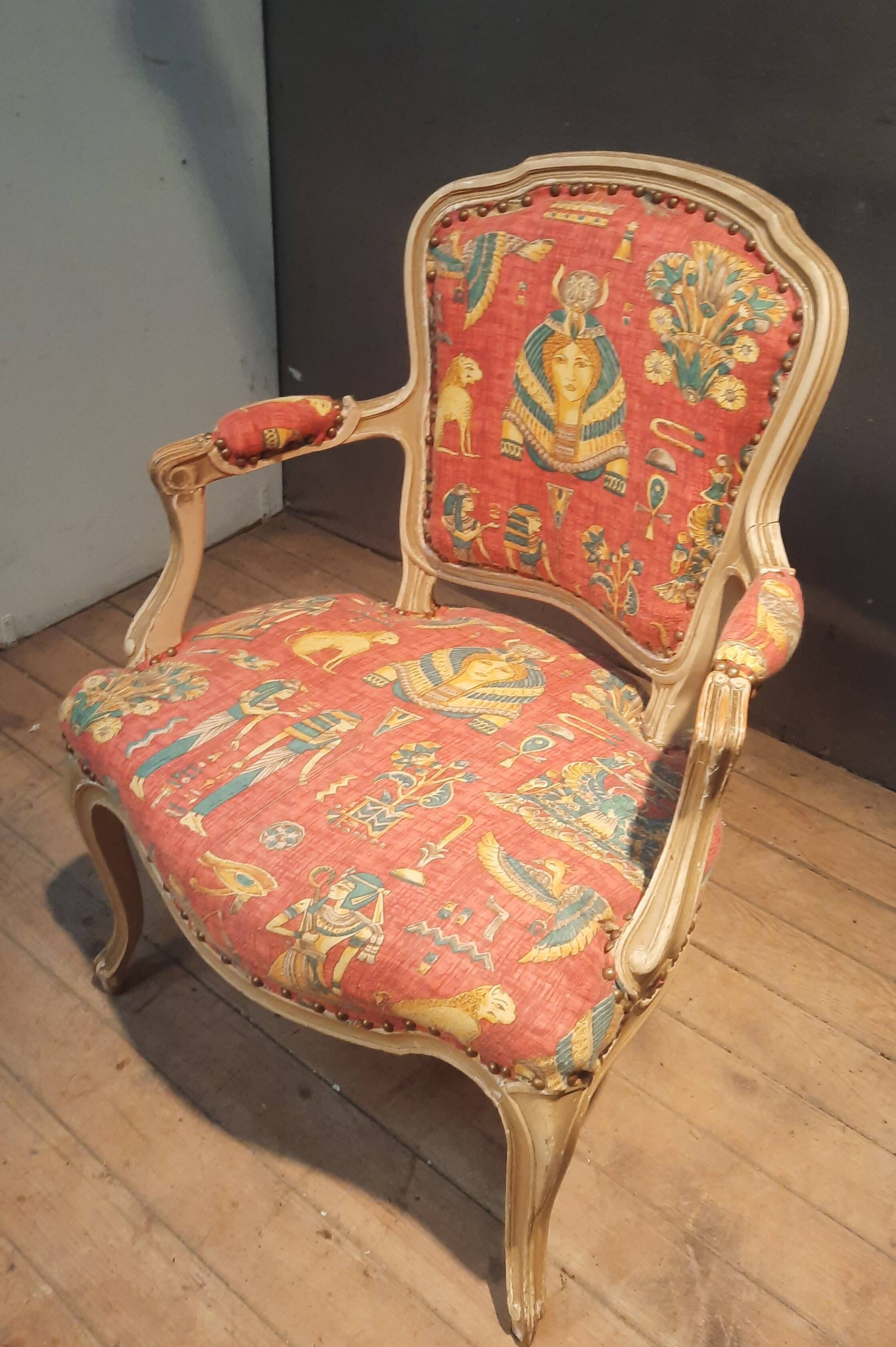 Louis XV style armchair upholstered with an Egyptian pattern.