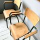 Set of four school teacher armchairs