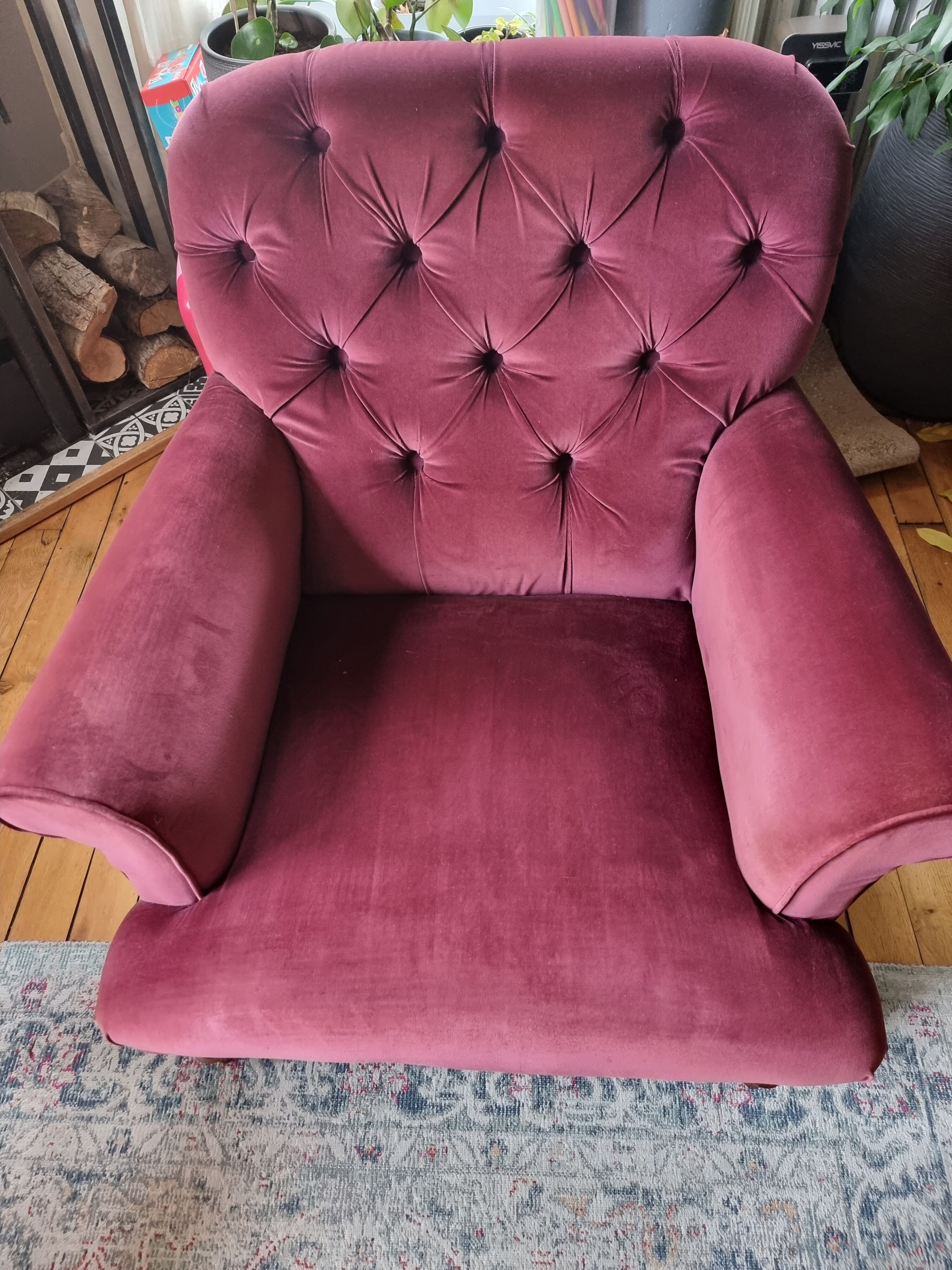 Upholstered velvet armchair