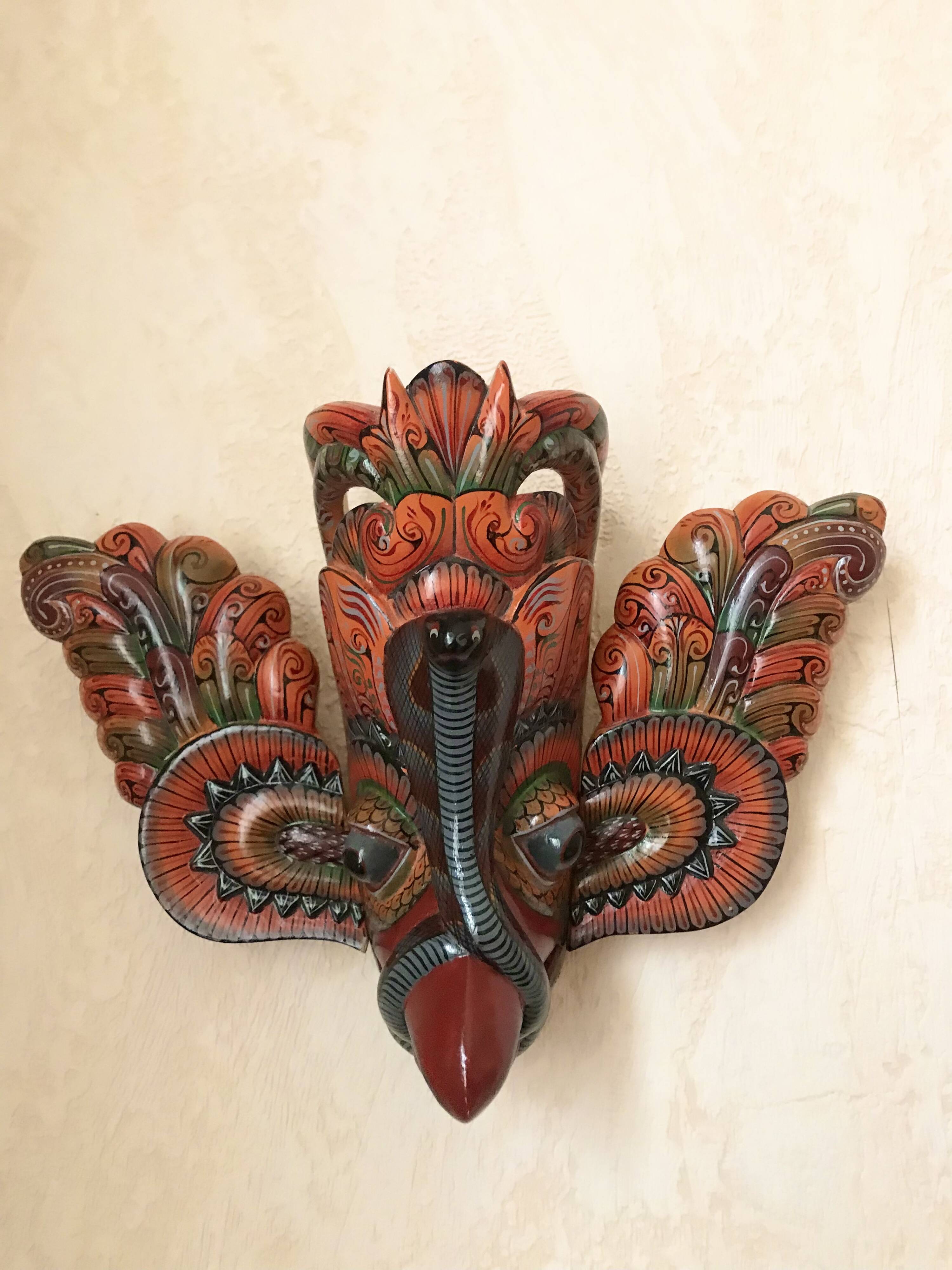 Wooden triptych mask