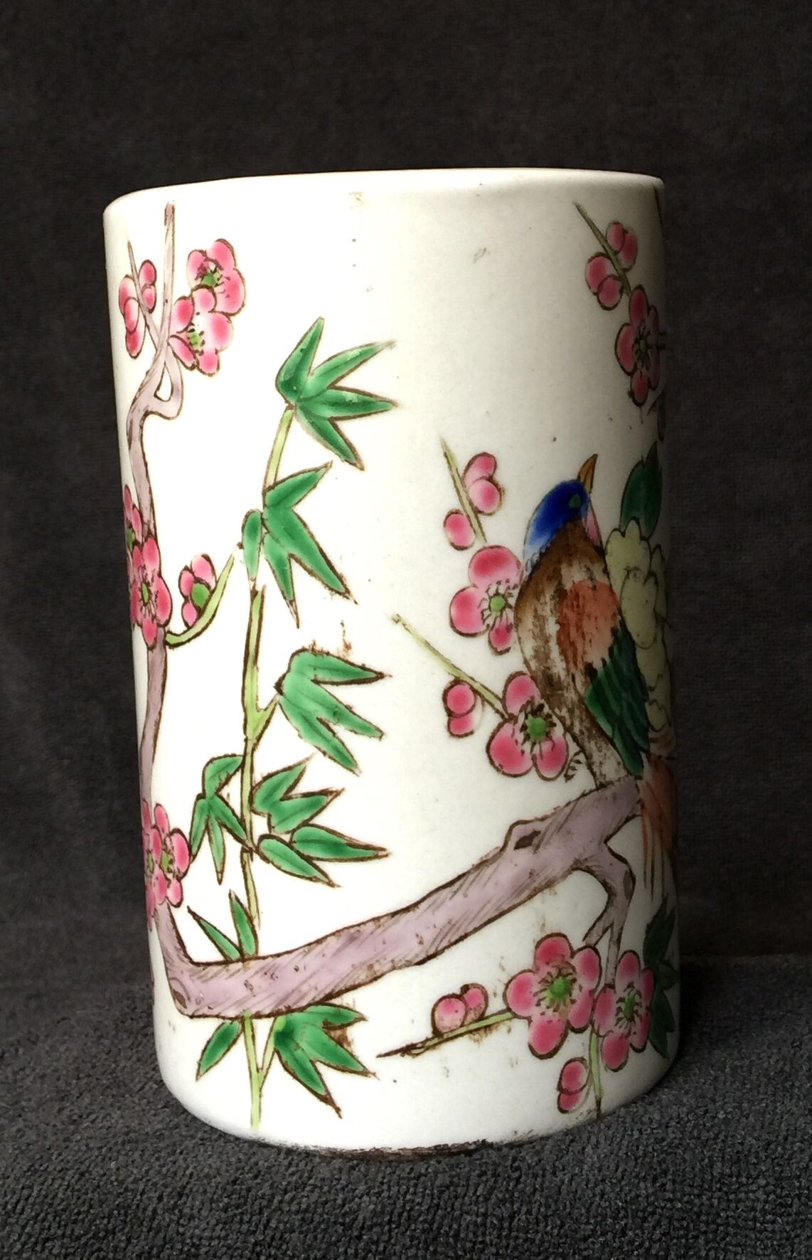 Small vase roll decoration birds branches of cherry blossoms and flowers