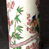 Small vase roll decoration birds branches of cherry blossoms and flowers