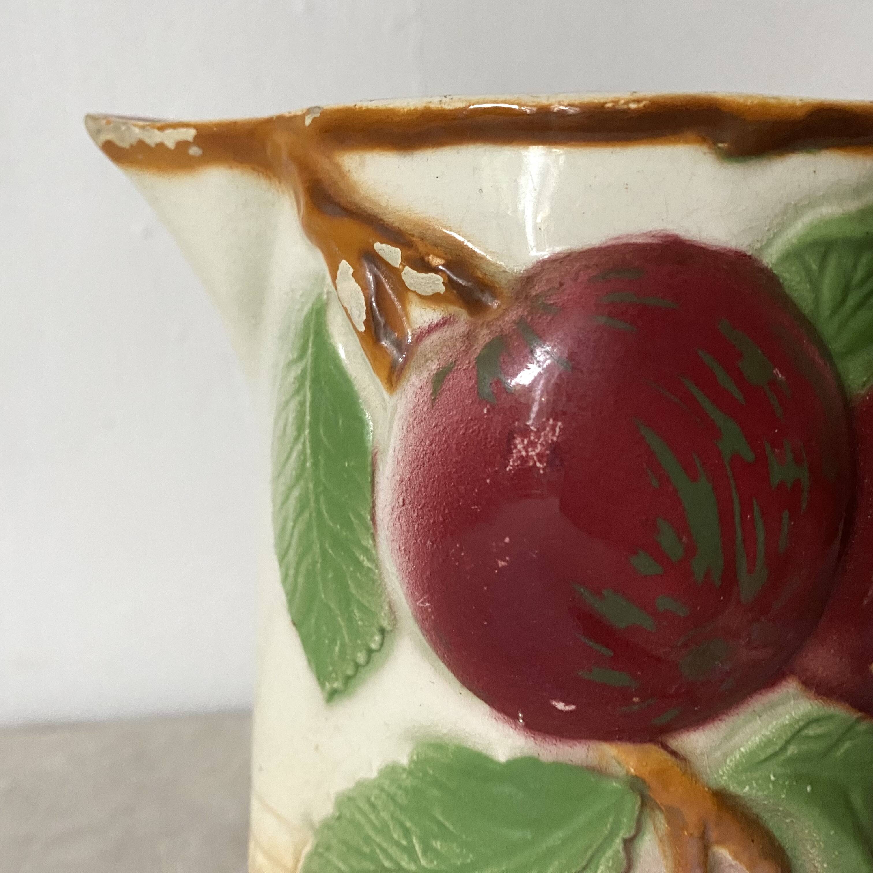 Antique pitcher in Apple slip