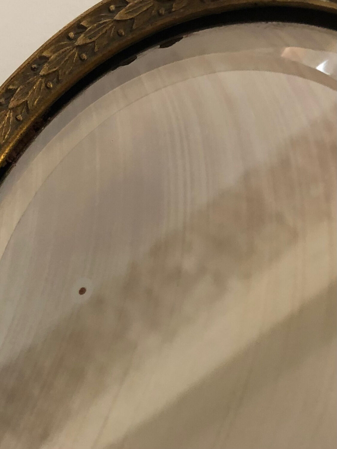 Hand mirror in gilded bronze