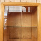 Art deco showcase in waved sycamore