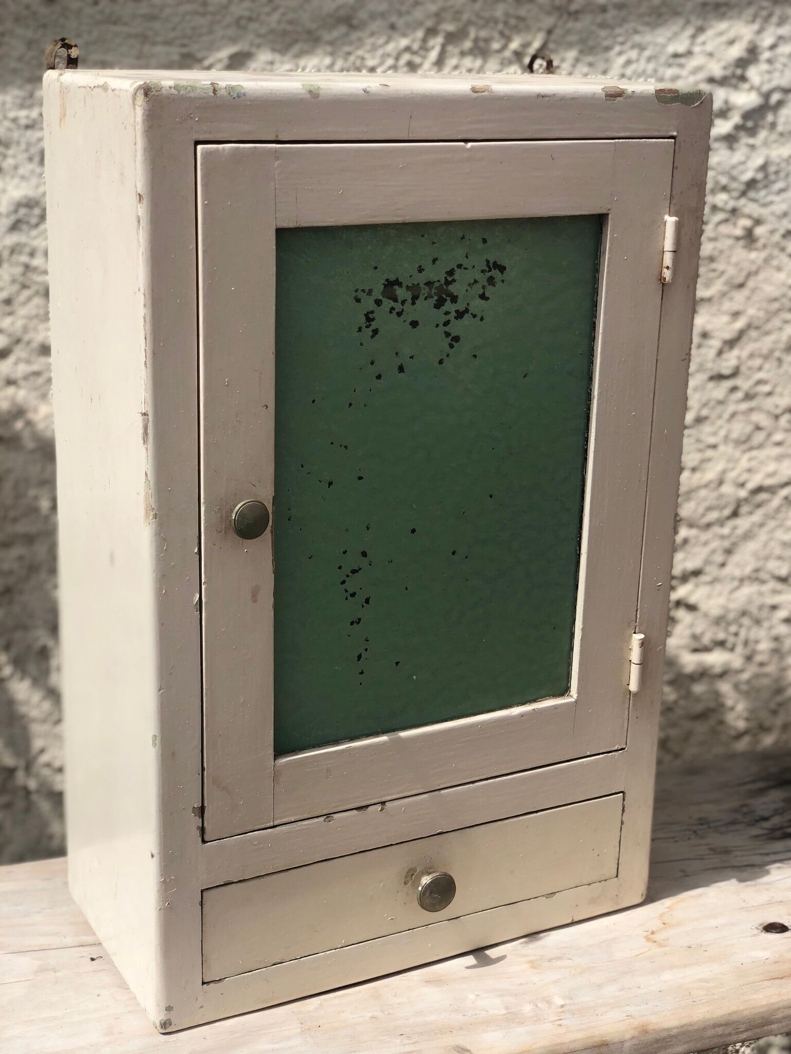 White medicine cabinet with window and drawer