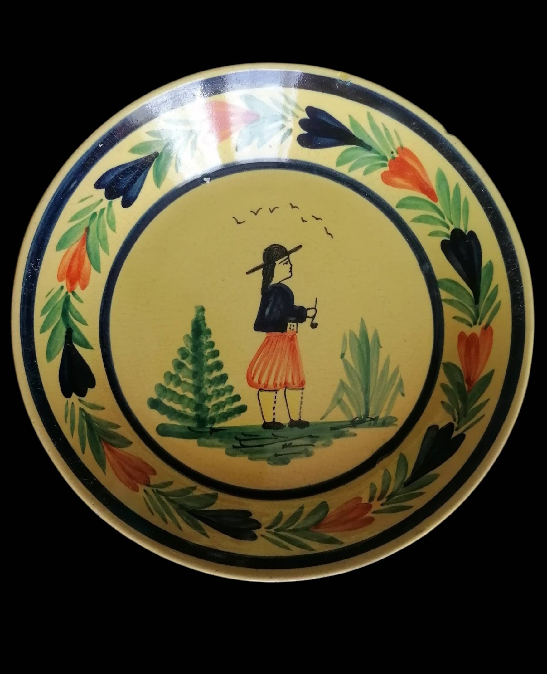 Two plates from the Breton faience HB Quimper.