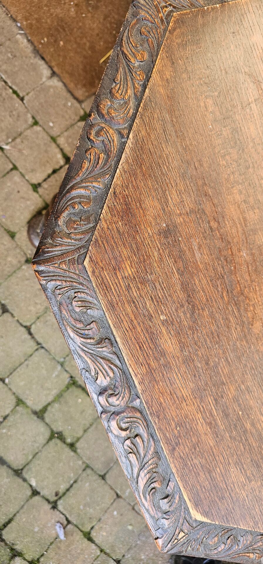 Large octagonal table in carved solid oak.