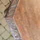 Large octagonal table in carved solid oak.