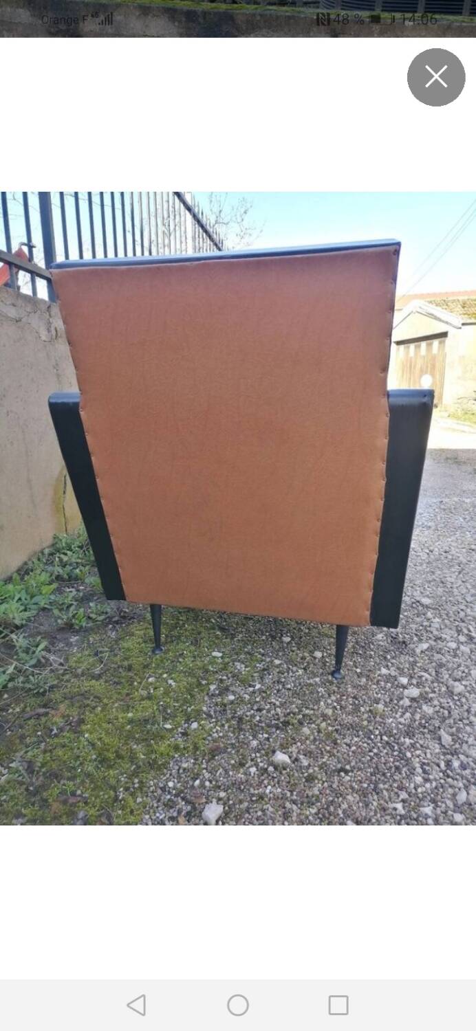 Pair of faux leather armchairs