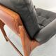 Fauteuil en teck et cuir années 1960