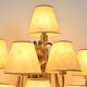 Wall sconce with nine arms in brass, France, circa 1950.