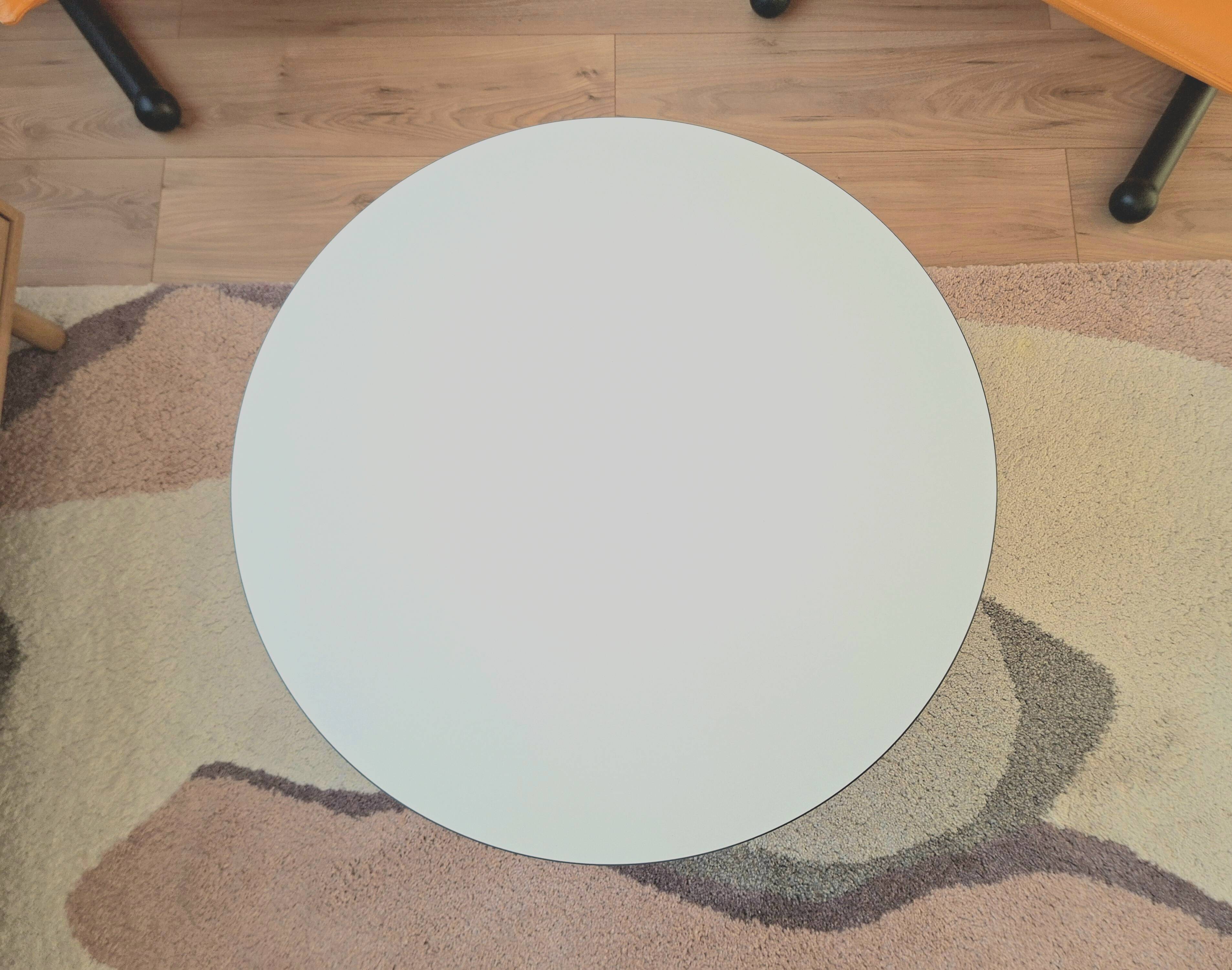 Table with orange slice by Paulin Artifort.