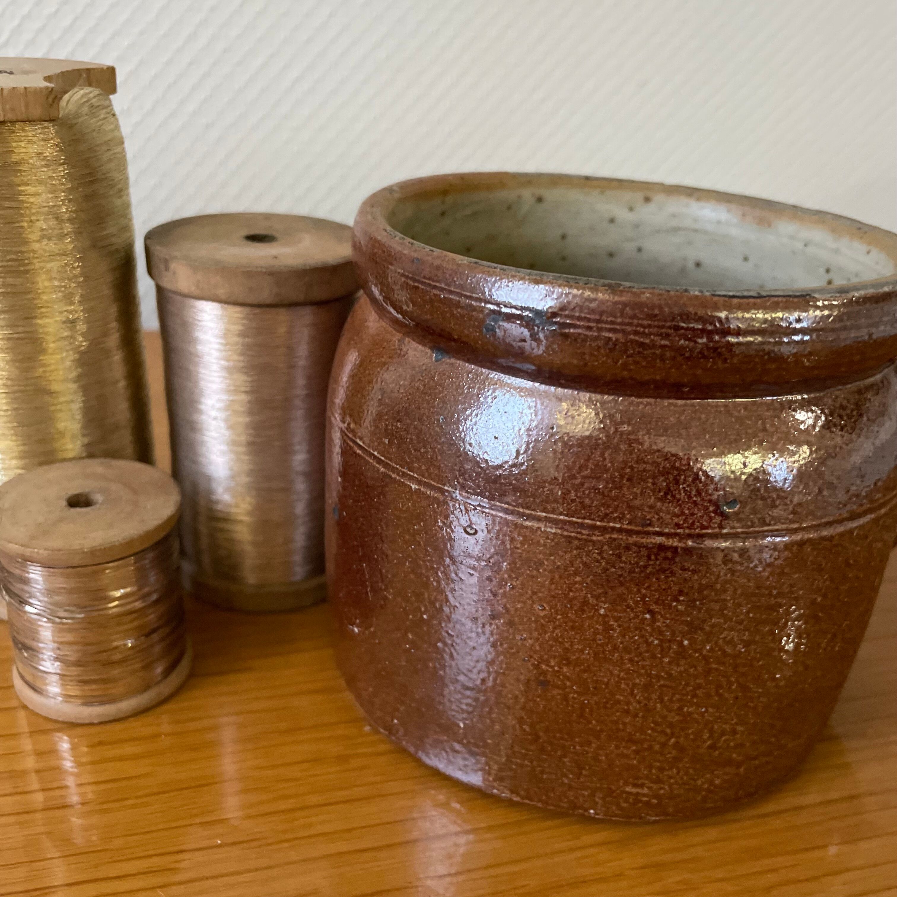 Stoneware pot with glossy glazed brown and vintage speckled gray handle