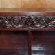 Hand-carved library circa 1900 in hardwood with Hermes statues.