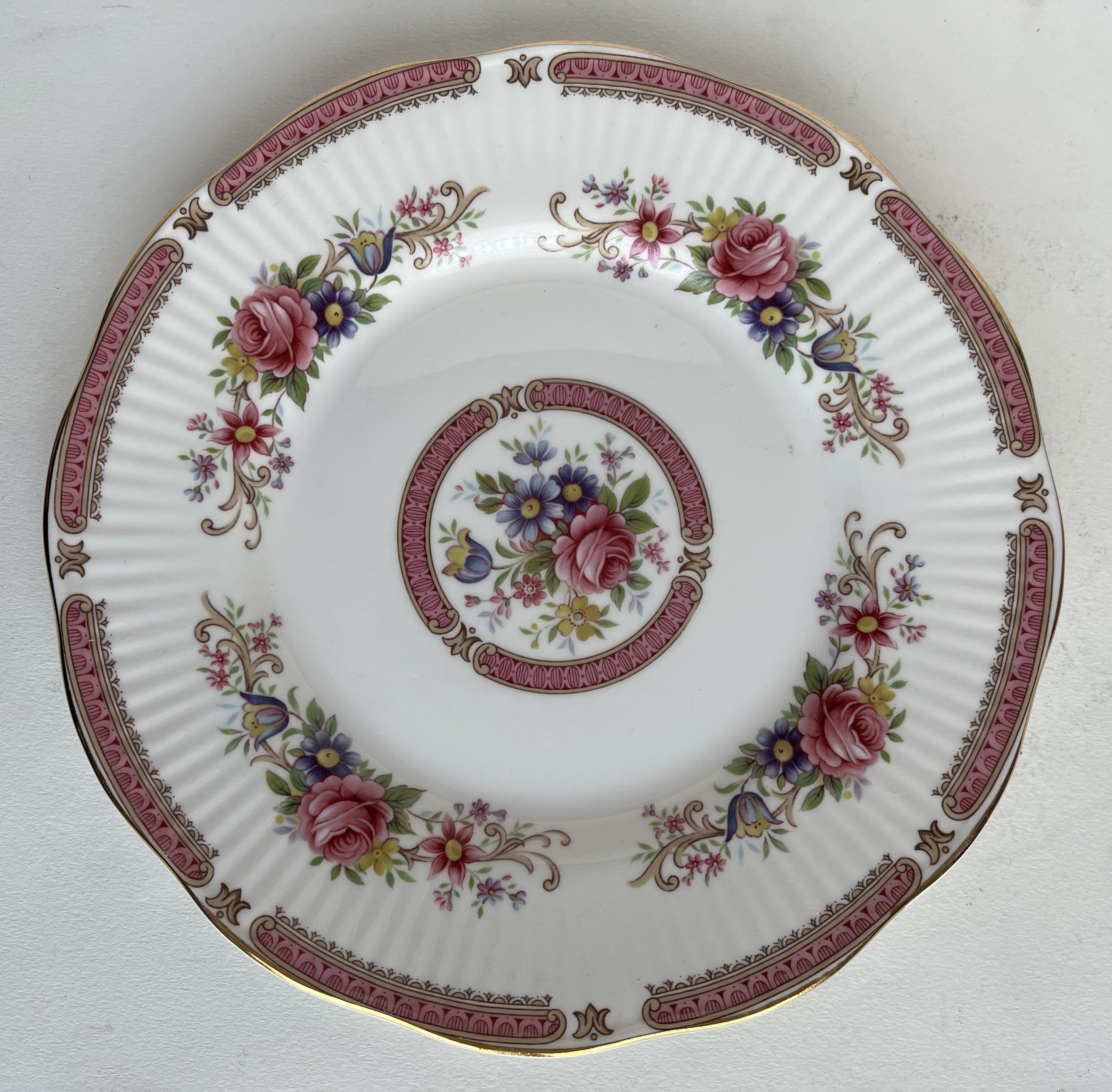 10 porcelain plates and a dish