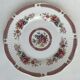 10 porcelain plates and a dish