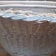 Wicker and painted wood baby cradle