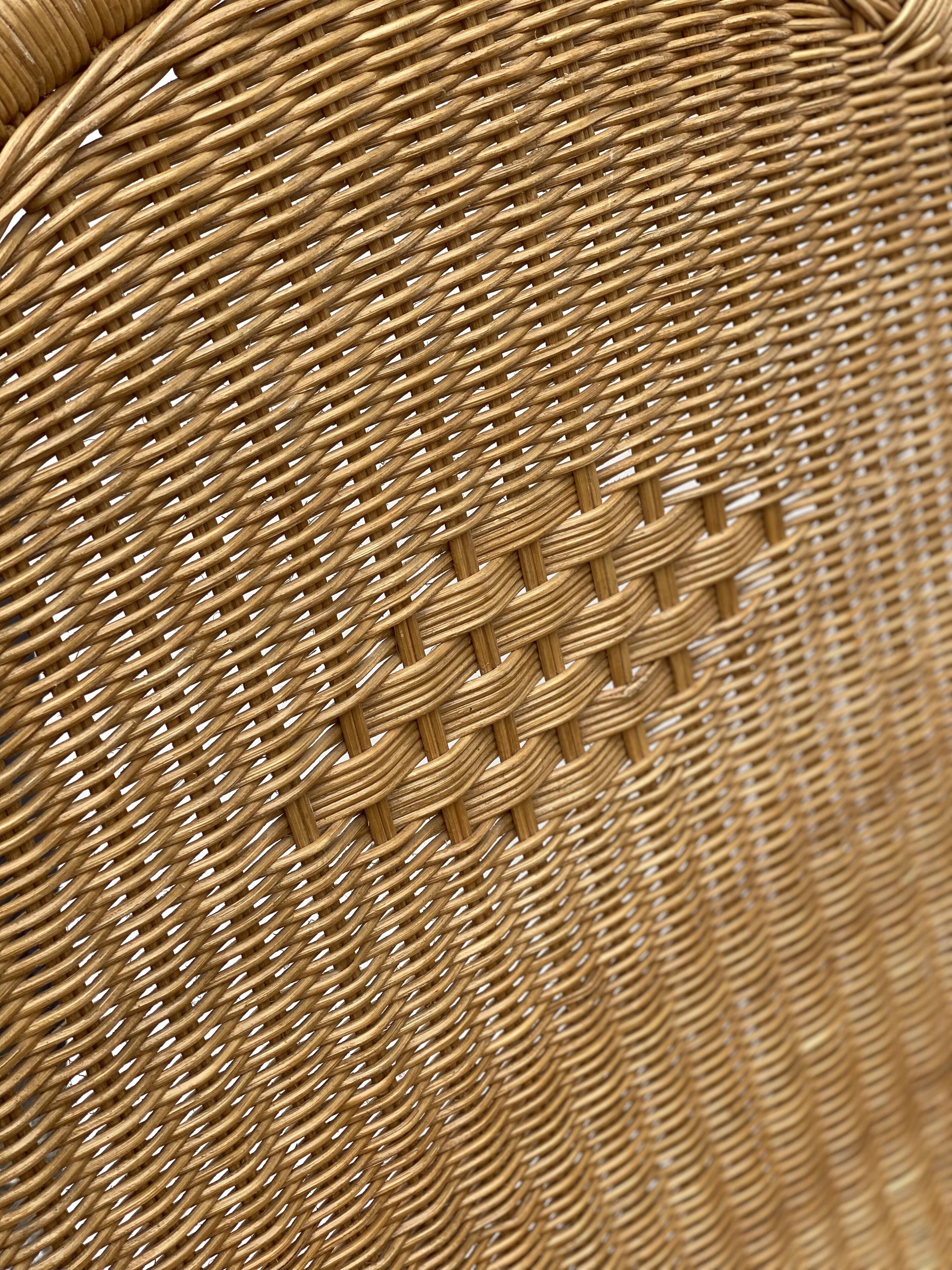 Vintage rotan and teak rocking chair