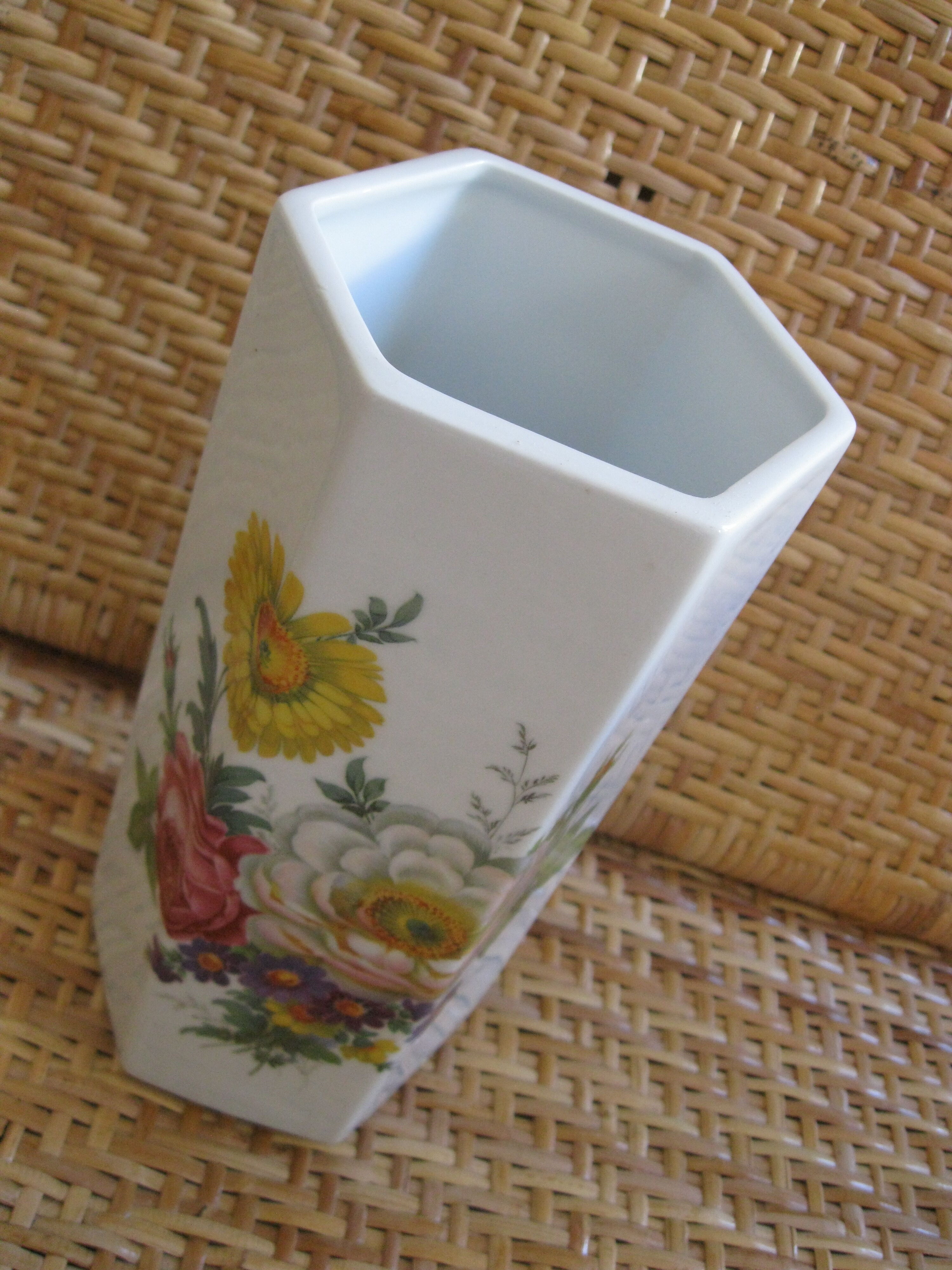 Flowery white porcelain faceted vase