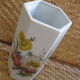 Flowery white porcelain faceted vase