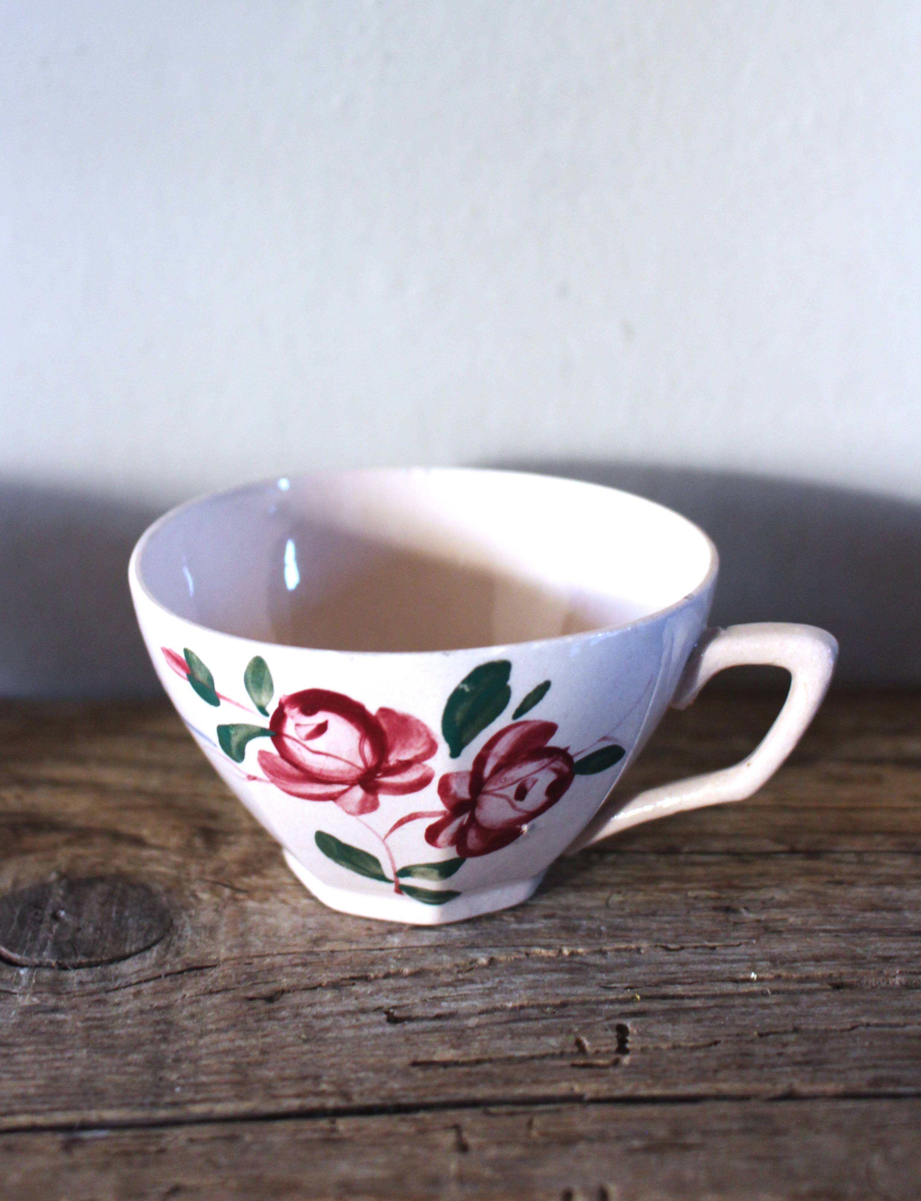 A set of 2 Digoin Sarreguemines cups with pink and blue flowers.