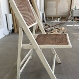 4 folding chairs with wicker seating