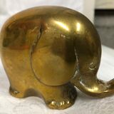 70s golden brass elephant paper press