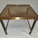 Small table or side table with brass structure and glass top from the 1970s.