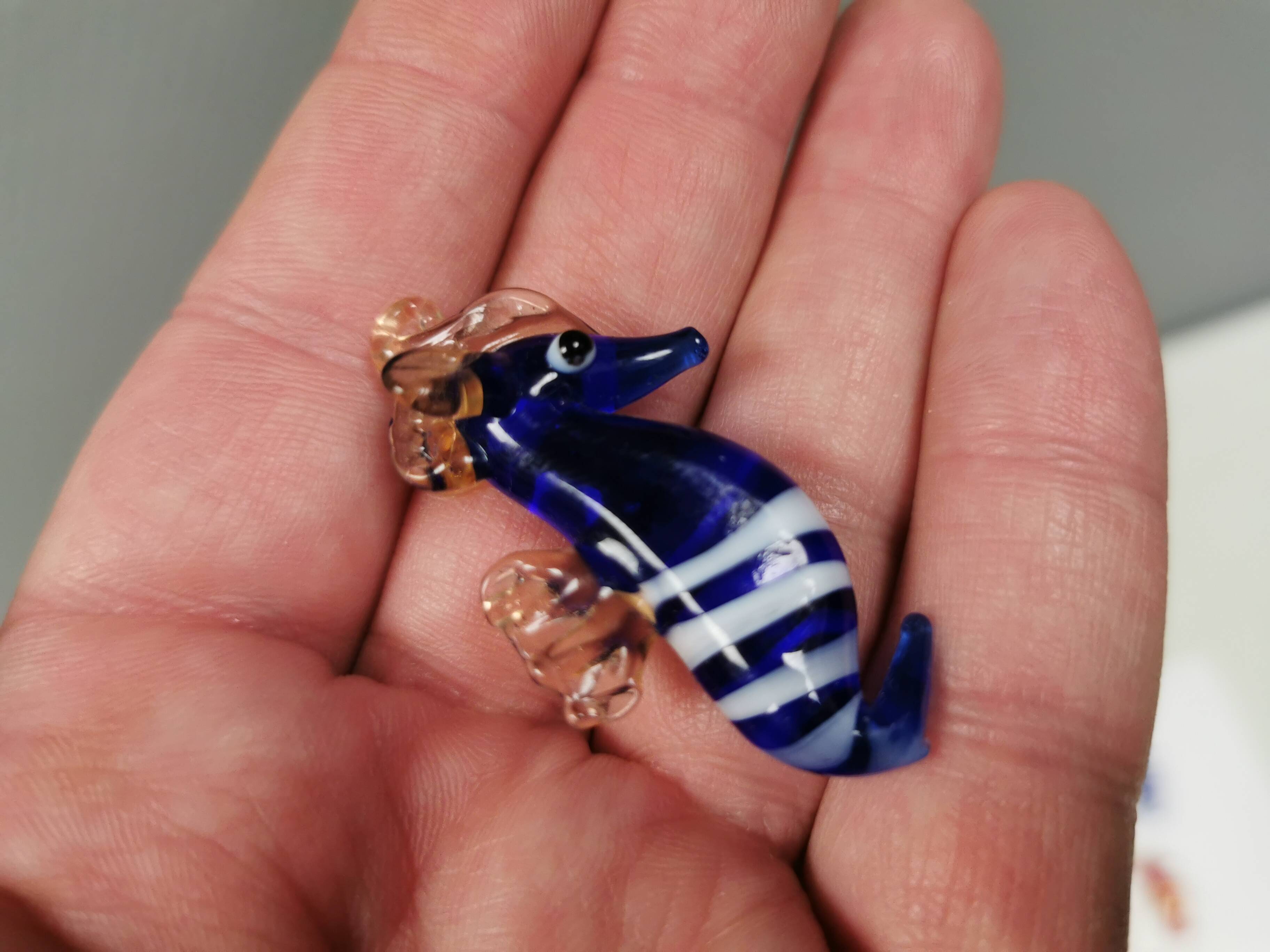 Six small Murano Seahorses in glass.