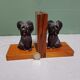 Mid 20th century wooden bookends with carved sitting dogs