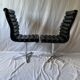 A set of four leather chairs, Italy, 80s