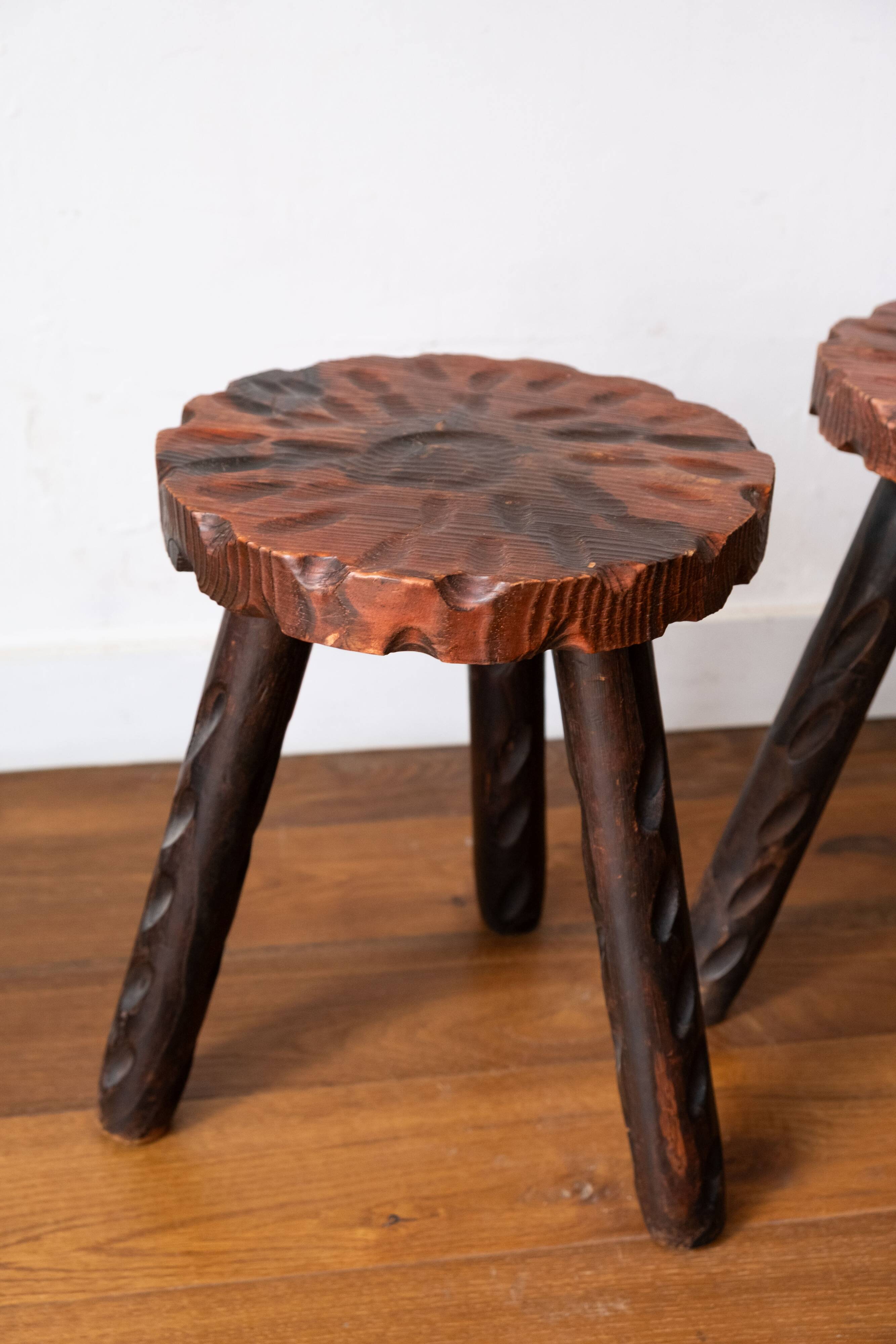 Set of two vintage round tripod stools, wooden farm stools.