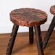 Set of two vintage round tripod stools, wooden farm stools.