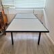 Italian metal table with frosted glass top, extendable.