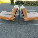 Paire de fauteuils chauffeuses contemporains cuir