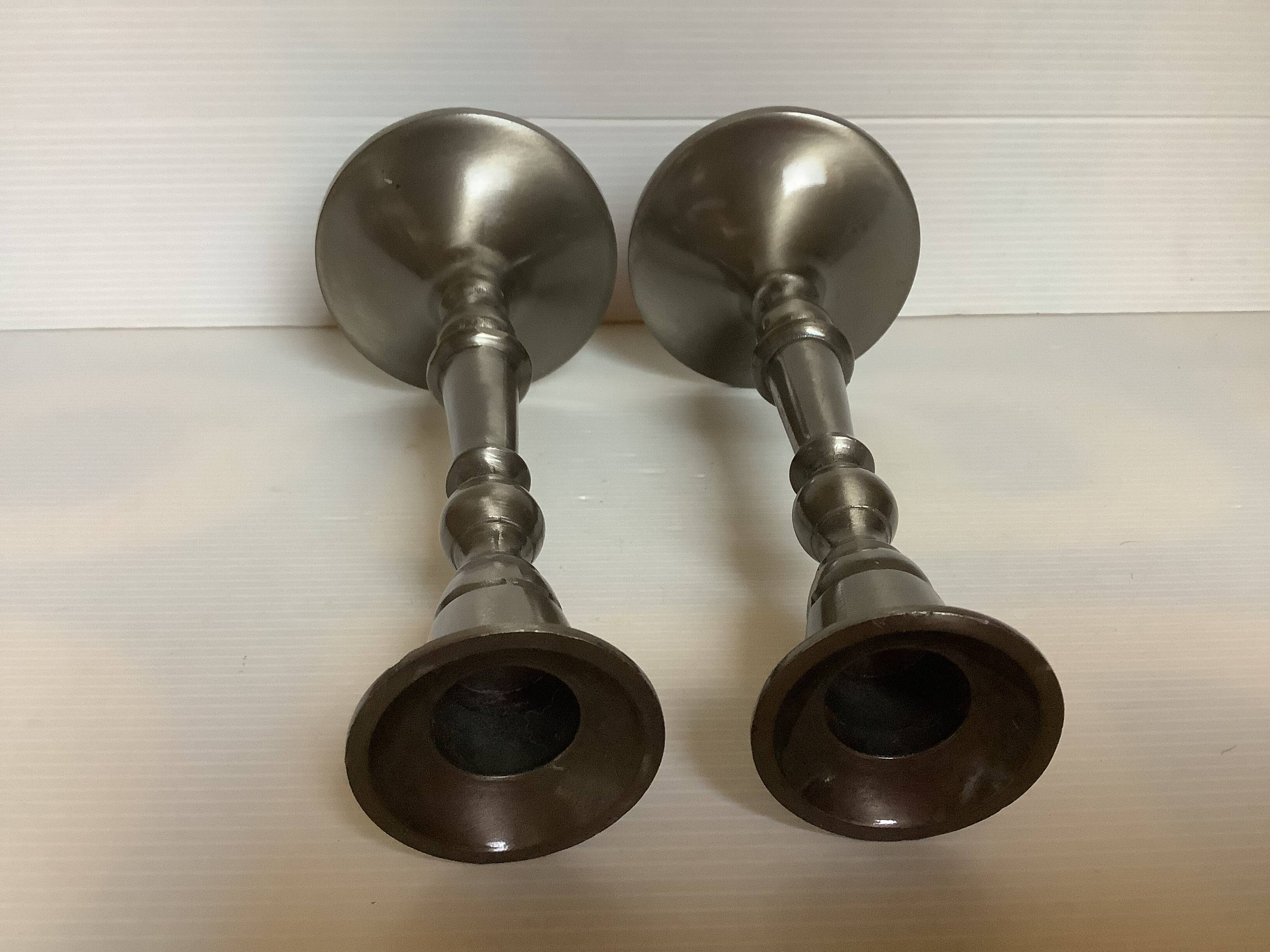 Pair of metal candlesticks