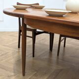 Round and extendable dining table published by G-Plan